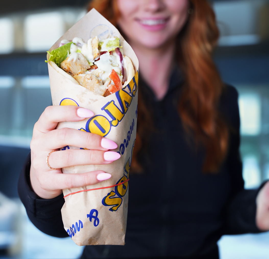 Lady holding a gyro